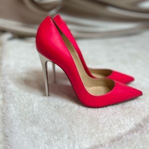 Designer Christian Louboutin pumps.